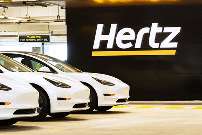 Hertz Wants To Buy 100,000 Teslas; Hires Tom Brady