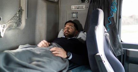 truck driver sleeping in cab