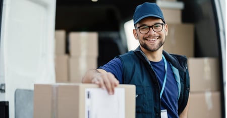 truck driver with boxes