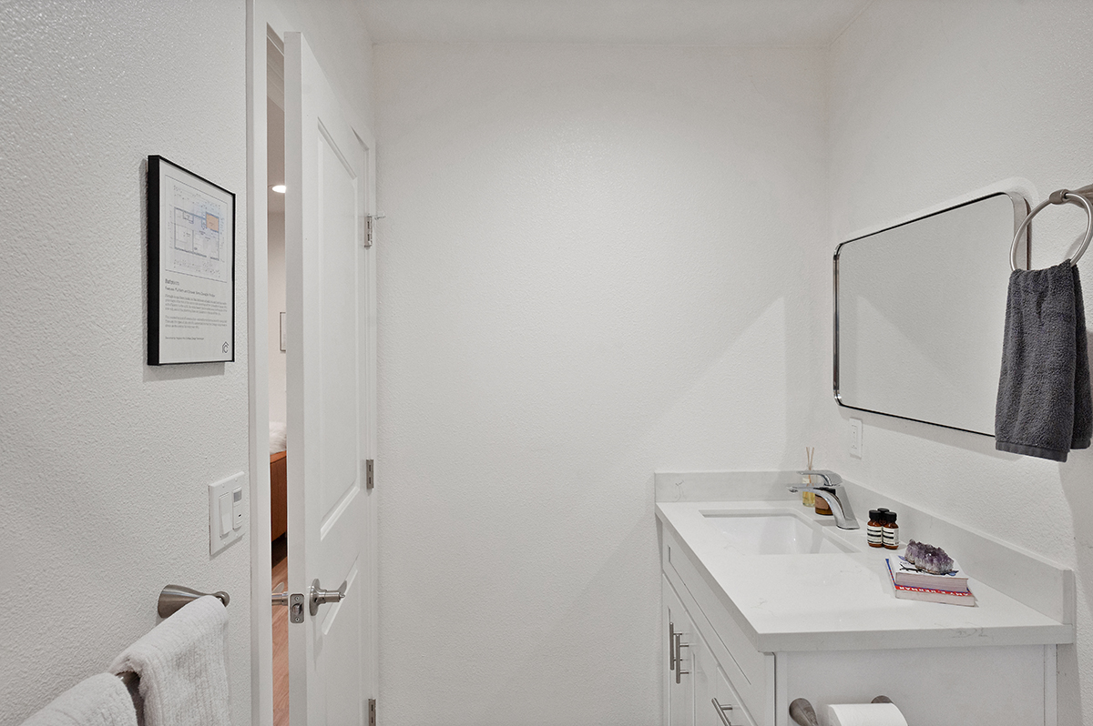The solar tube above the bathroom allows for natural light into the space.