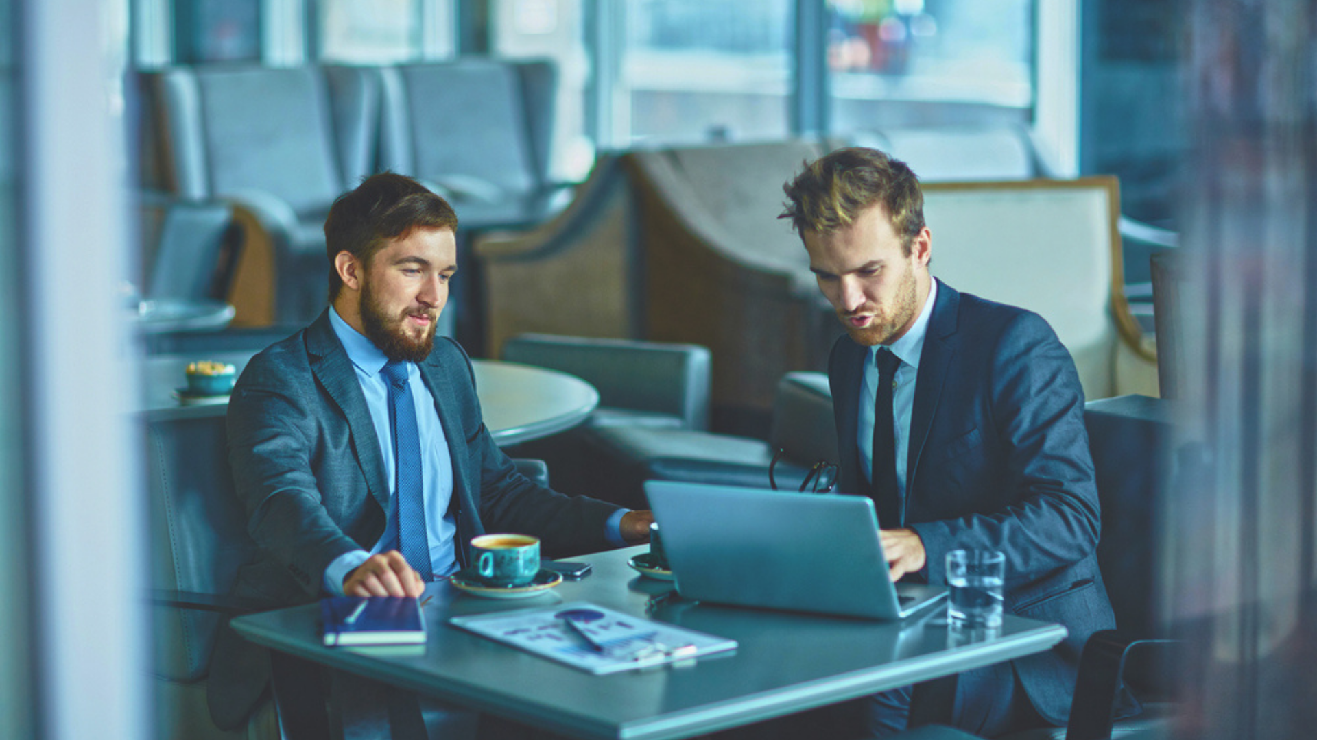 Group of people working on a computer Software Development