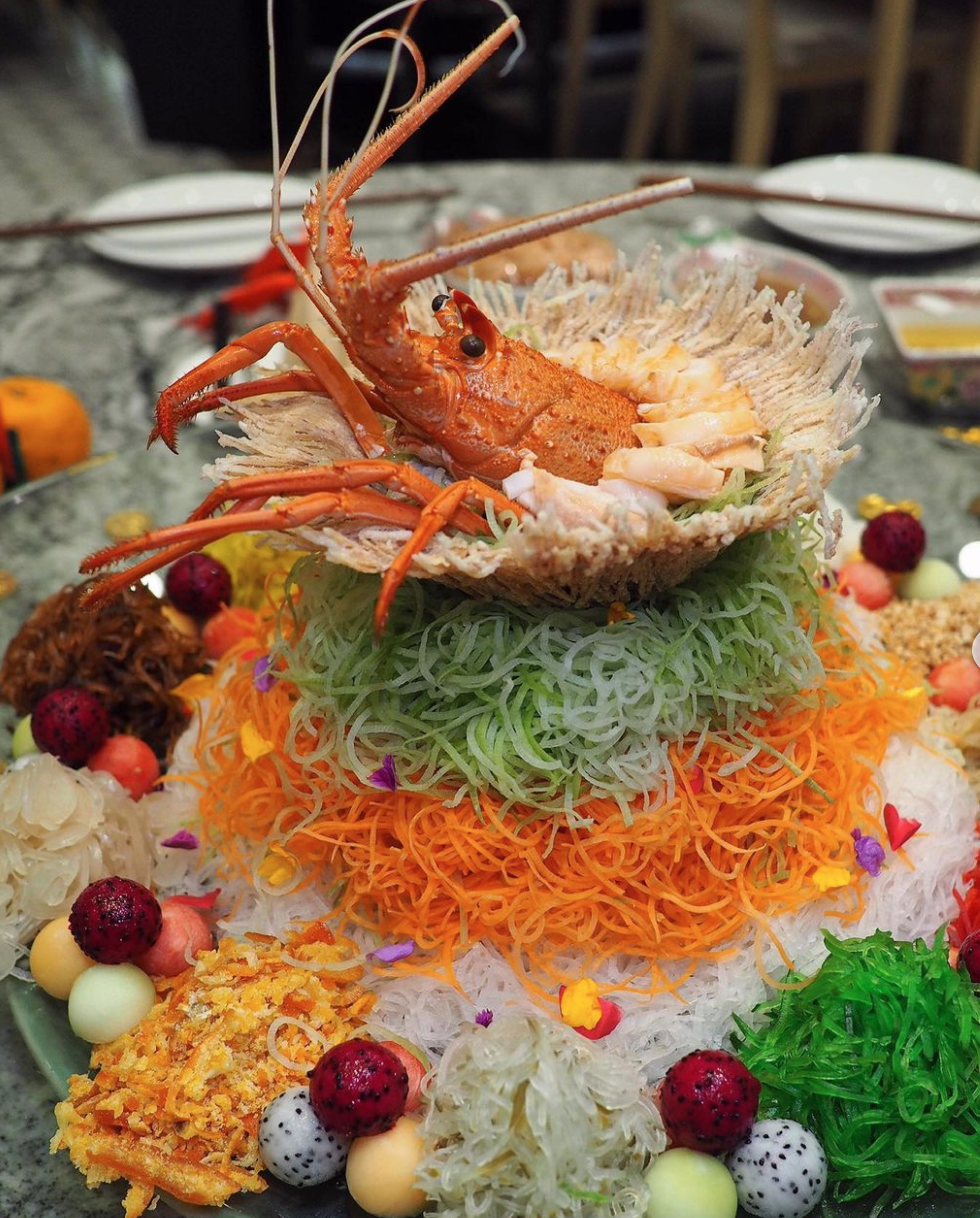 Singaporean New Years dish, Lo Hei topped with lobster